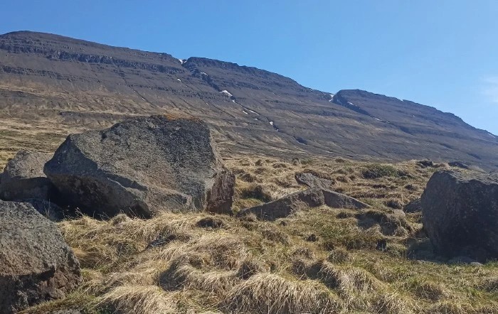 On Steinahjalli. The rock on the left is where the huldufólk children lived, that Margrét played with in her childhood.